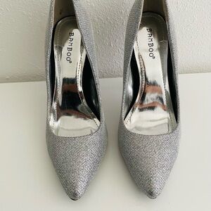Beautiful silver pump heels, 4 1/2 heel and never used.